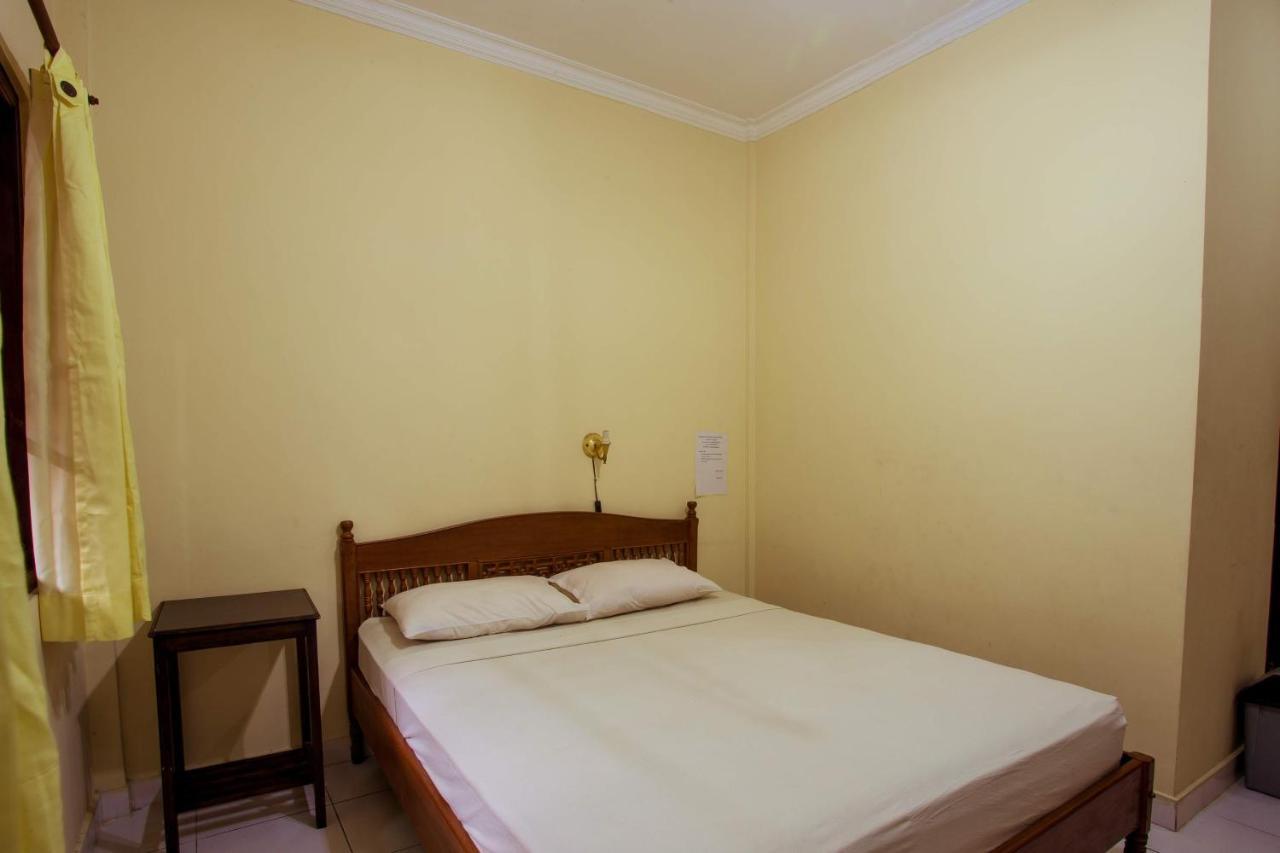 Segara Sadhu Inn Kuta By Ecommerceloka Extérieur photo